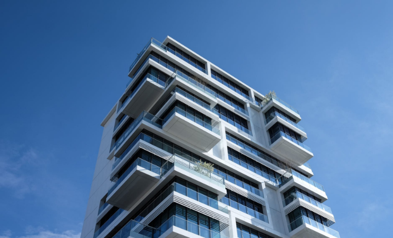 a tall building and blue sky